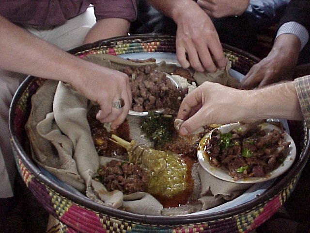 ethiopian20food20being20eaten20in20the20traditional20manner20by20journalists.jpg